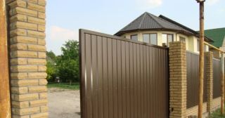 Купить откатные ворота из профнастила Усть-Кут, цена от 1742 руб.